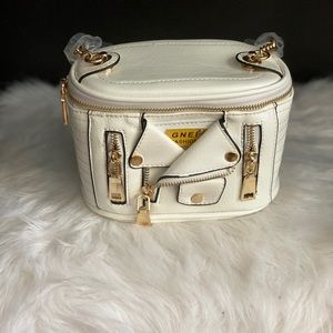 Love X. Clusively Handbag